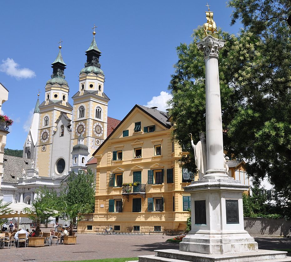 Aerial view of Brixen city in South Tyrol with mountains in the background